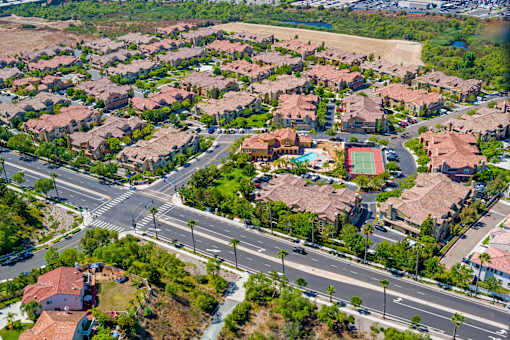 A suburban neighborhood with houses and streets.