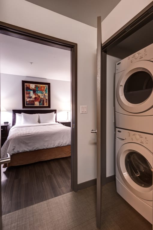 bedroom and laundry area