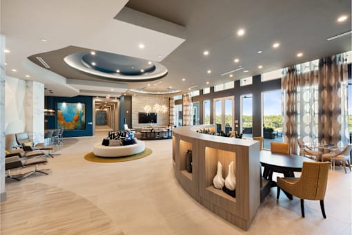 A modern living room with a curved ceiling and a fireplace.