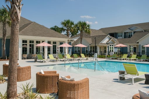 Pool area with chairs at The Isley at Windsor Hill, North Charleston, SC, 29420
