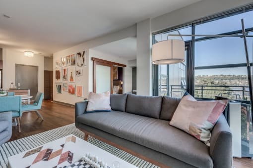 Dining Table Along Side With Living Room at Equinox, Seattle, WA, 98102