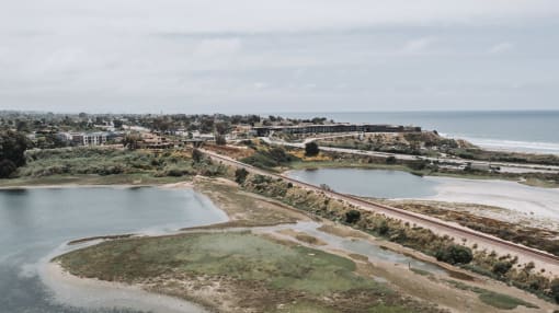 a view of the ocean and the city from a vantage point