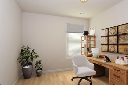 a home office with white walls and a wooden desk with a white chair
