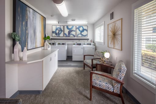 Living room with two chairs and a table and a kitchen at Summerfield, Tigard, OR, 97224