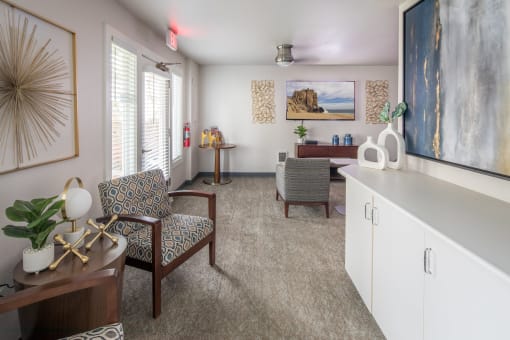 Living room with a dining room table and chairs and a kitchen at Summerfield, Tigard
