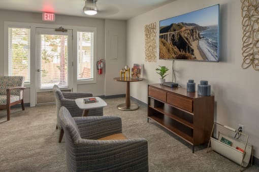Living room with chairs and a table and a television at Summerfield, 97224