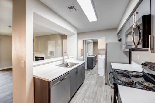 Kitchen with Stainless Steel Appliances at 5400 Vistas Apartments, Las Vegas