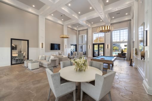 clubhouse with seating area and a pool table