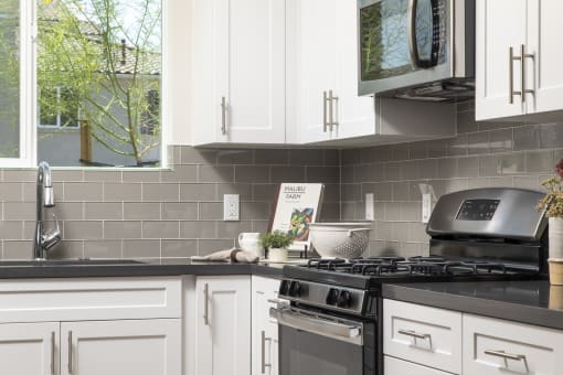 Kitchen cabinets and appliances  at Sorano Apartments, Moreno Valley, CA, 92557