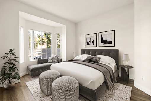 Bedroom with a large bed and a potted plant  at Cahuenga Heights, Los Angeles