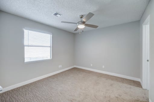 Empty Room with a Ceiling Fan at 5400 Vistas Apartments, Nevada