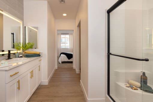 model apartment bathroom with shower stall at Element 12 Apartments, Henderson NV