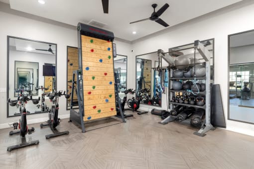 a climbing rock wall inside the gym