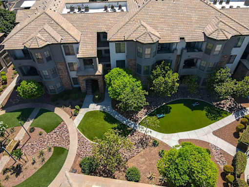 A large apartment complex with a courtyard in the center.