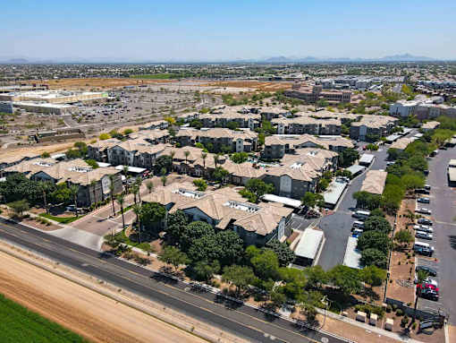 A suburban area with houses and a road.