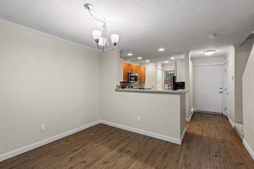 Open floor plan with kitchen passthrough at Hubbard's Crossing Apartments, Kirkland