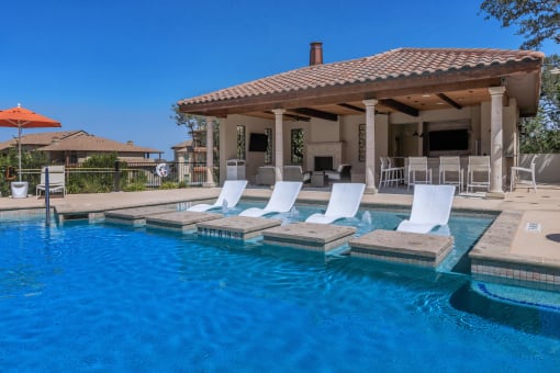 Relaxing pool with tanning ledge