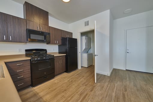 Kitchen with washer and dryer in the closet at Alpine Vista, Colorado, 80922