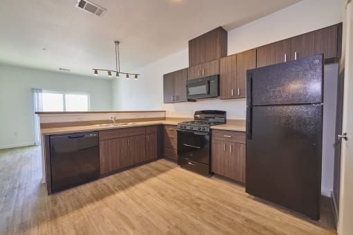 Kitchen with brown cabinets at Alpine Vista, Colorado 