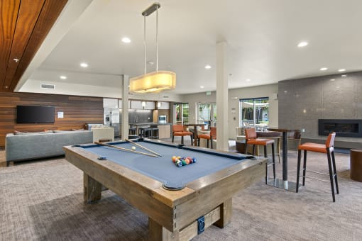 our apartments have a clubhouse with a pool table and a flat screen tv at Allez, Redmond, WA