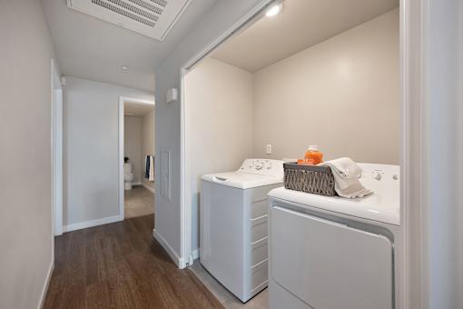 A laundry room with a washer and dryer.