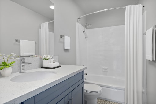 a bathroom with a sink and a toilet and a shower at The Fulton, Los Angeles, California, 91423