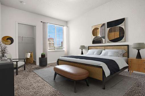 A modern bedroom with a large bed and a large window.