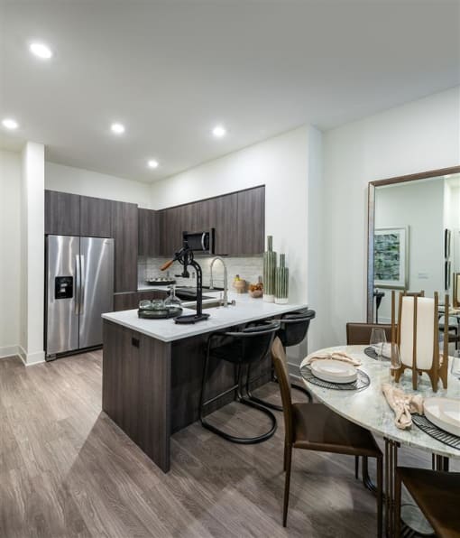 Kitchen with dining and cabinets  at Kinley West LA, Los Angeles, CA
