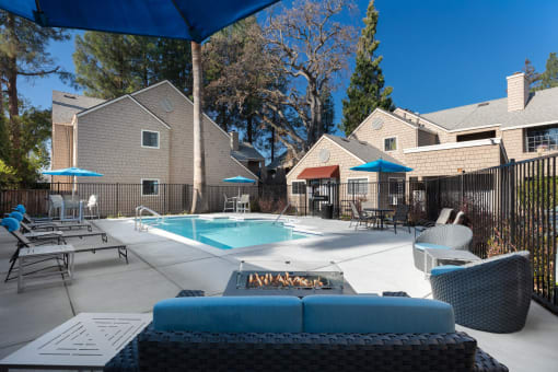our apartments have a pool and lounge area with furniture