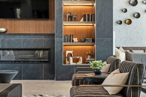 a living room with a couch and a fireplace