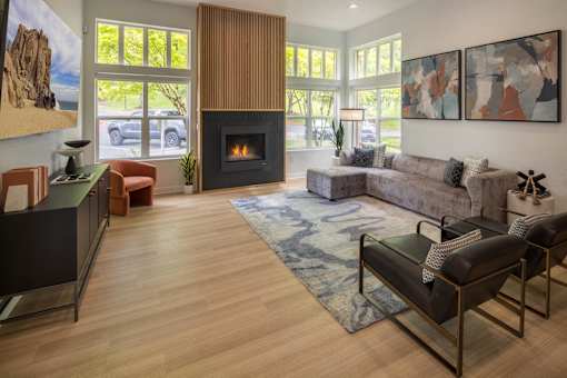 A living room with a fireplace and a couch.