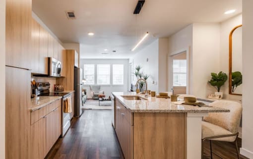 a kitchen with a counter top and a sink