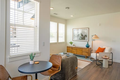 a living room with a couch and a table