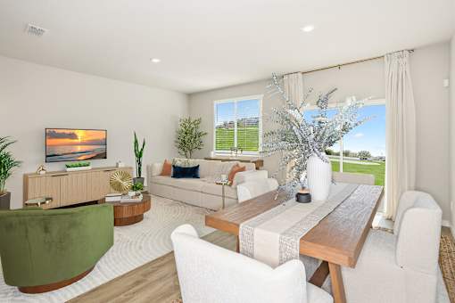 A modern living room at Coral Palms at Oakleaf Middleburg, FL homes.