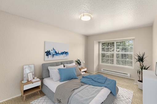A bedroom with a bed, nightstand, and a painting on the wall.