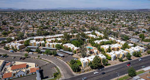 A view of a residential area with houses and roads.