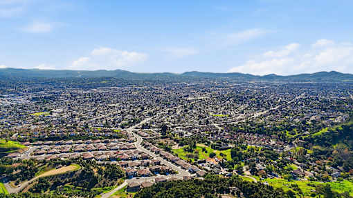 Escondido, CA cityscape with a mix of residential and green areas.