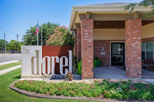 a building with a large sign that says the door