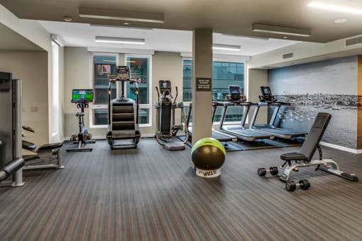 Fitness Center With Yoga/Stretch Area at AV8 Apartments in San Diego, CA
