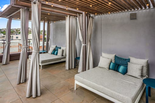 Outdoor Day Beds at AV8 Apartments in San Diego, CA