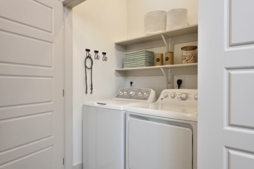 Laundry Room1 at The Flats at West Alabama, Houston, TX