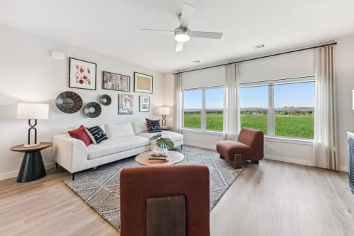 living room with couch and chairs