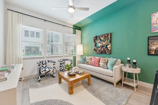 a living room with a couch and a table