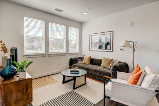 a living room with a couch and a coffee table