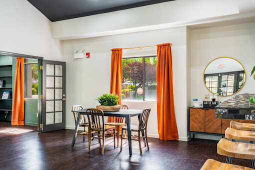 Dining room with a table and chairs at Eagle Point Apartments, New Mexico, 87111
