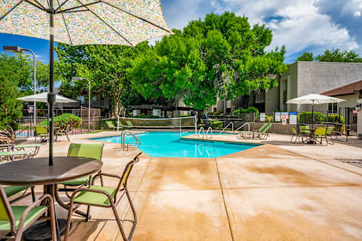 Pool area with seating at Eagle Point Apartments, Albuquerque, NM