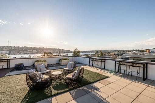 Equinox Rooftop Terrence seating area  at Equinox Apartments, Seattle, WA