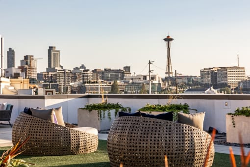 Equinox Rooftop Terrence view of Space Needle  at Equinox Apartments, Seattle, Washington
