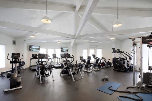 a gym with weights and other exercise equipment