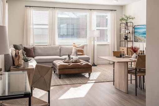 a living room with a couch and a table